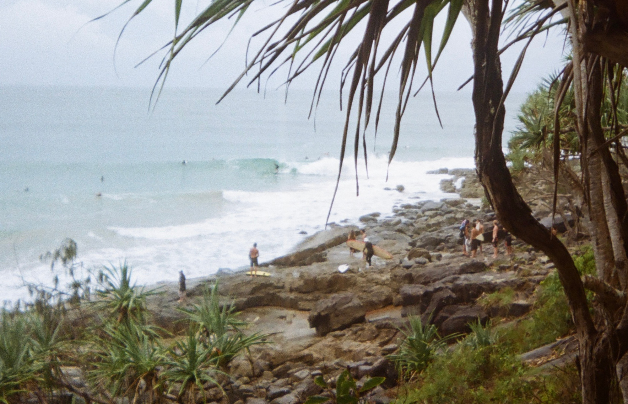 Surfers using Board Butter by Saltwater Cowboy surfing at Noosa Heads.